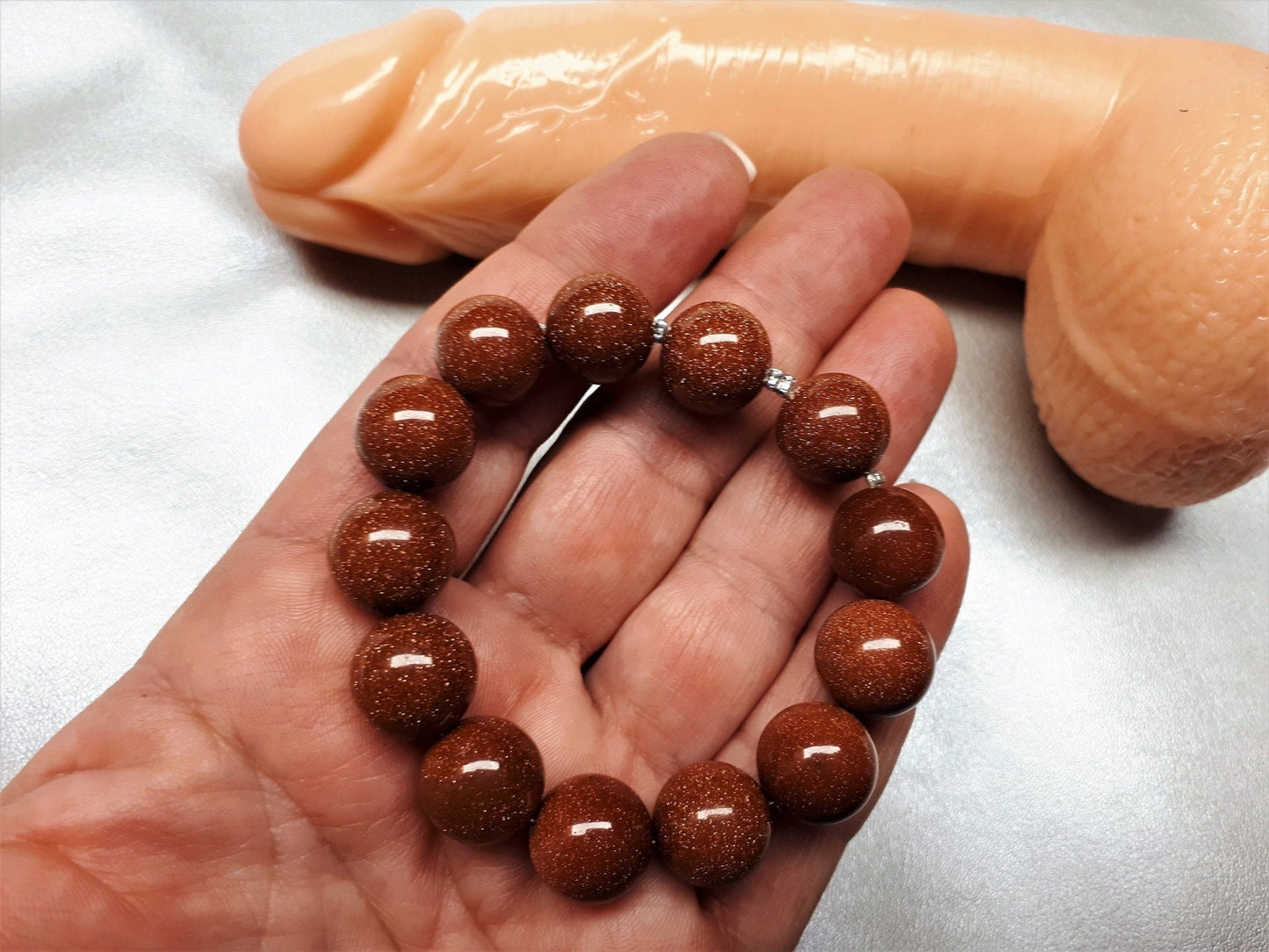 Penisring Masturbator 9 verdrehte Elypsen nougart - braune Goldfluss Steinperlen auf Chirurgenstahlseil - SEXSENSE