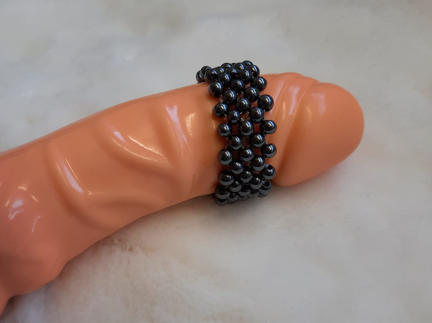Penisring Masturbator 95 rotierende Hämatit - Perlen auf Chirurgenstahl Innen - Umfang ca 12,5cm - SEXSENSE