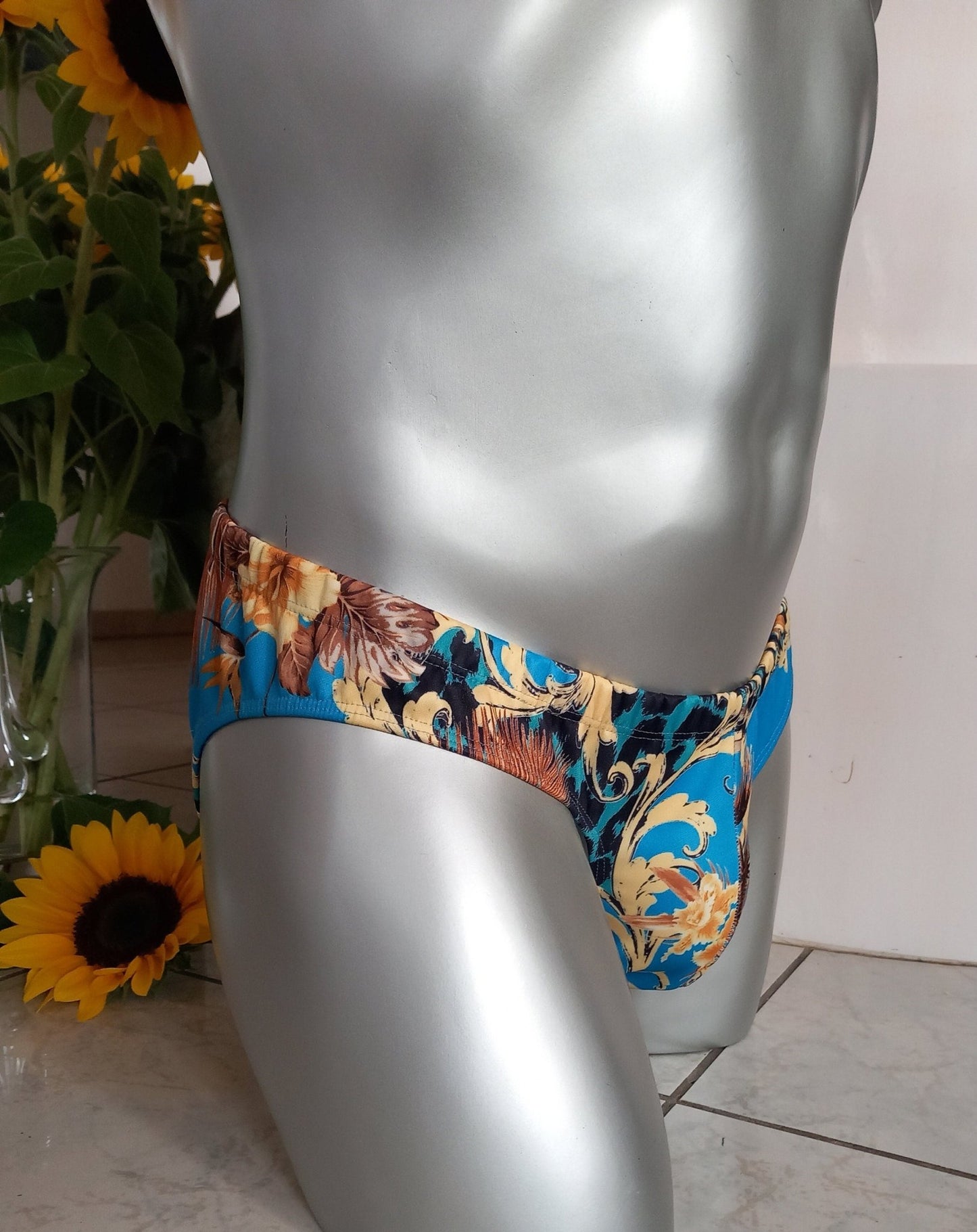 Badehose full Butt elastisches Scuba Jersey Leo und Flower - Design auf türkis - SEXSENSE