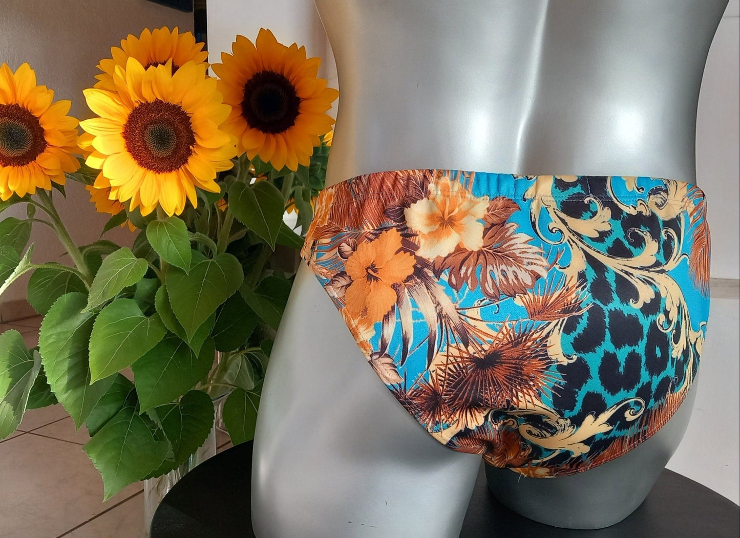 Badehose full Butt elastisches Scuba Jersey Leo und Flower - Design auf türkis - SEXSENSE