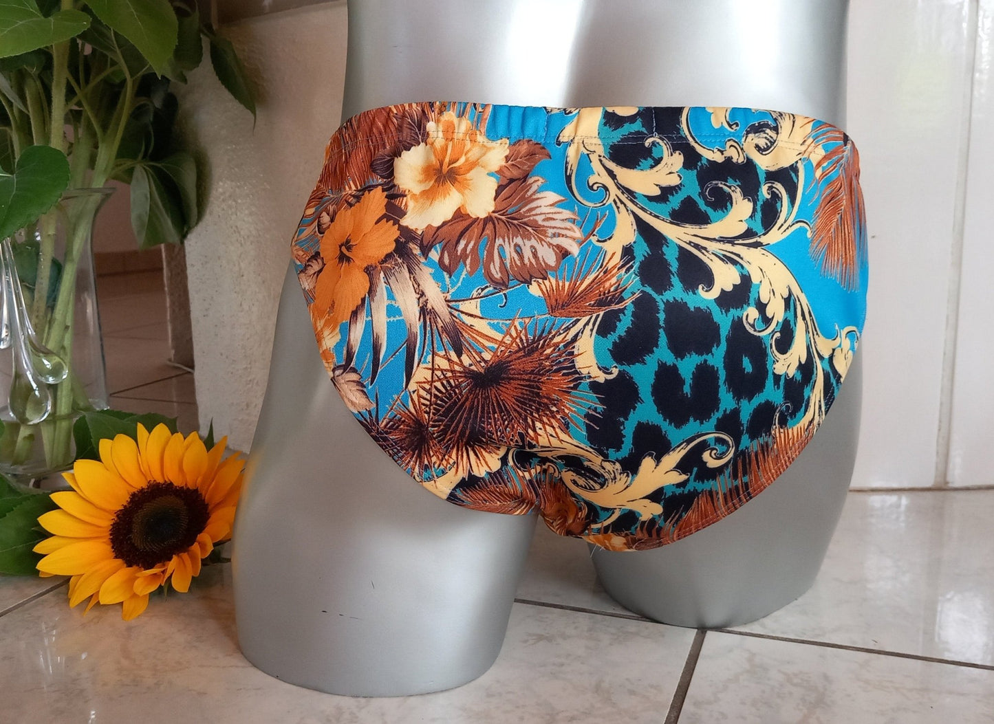 Badehose full Butt elastisches Scuba Jersey Leo und Flower - Design auf türkis - SEXSENSE