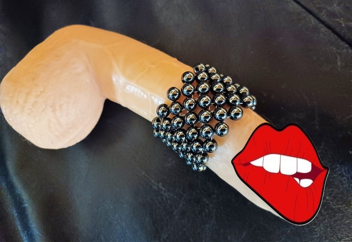 Kinky Penisring Masturbator 7 reihig 98 rotierende Hämatit - Perlen auf Chirurgenstahl Innen - Umfang ca 11,3cm - SEXSENSE