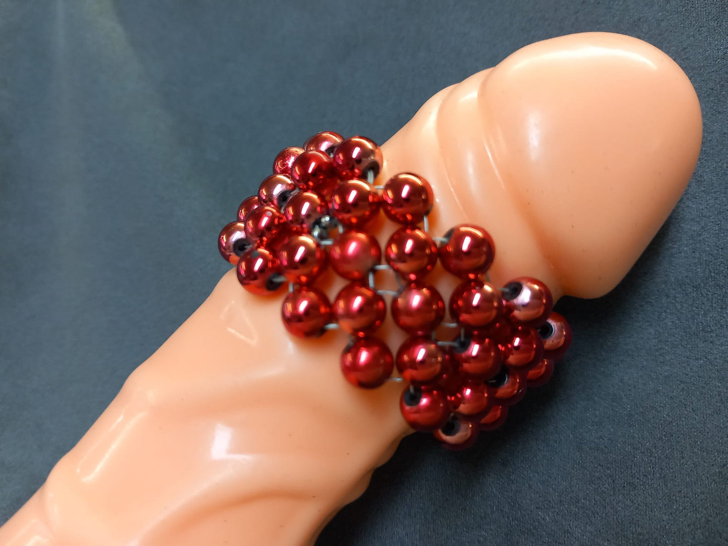 Penisring Masturbator 75 rotierende Blut rot Hämatit - Perlen auf Chirurgenstahl Innen - Umfang ca 11,6cm - SEXSENSE