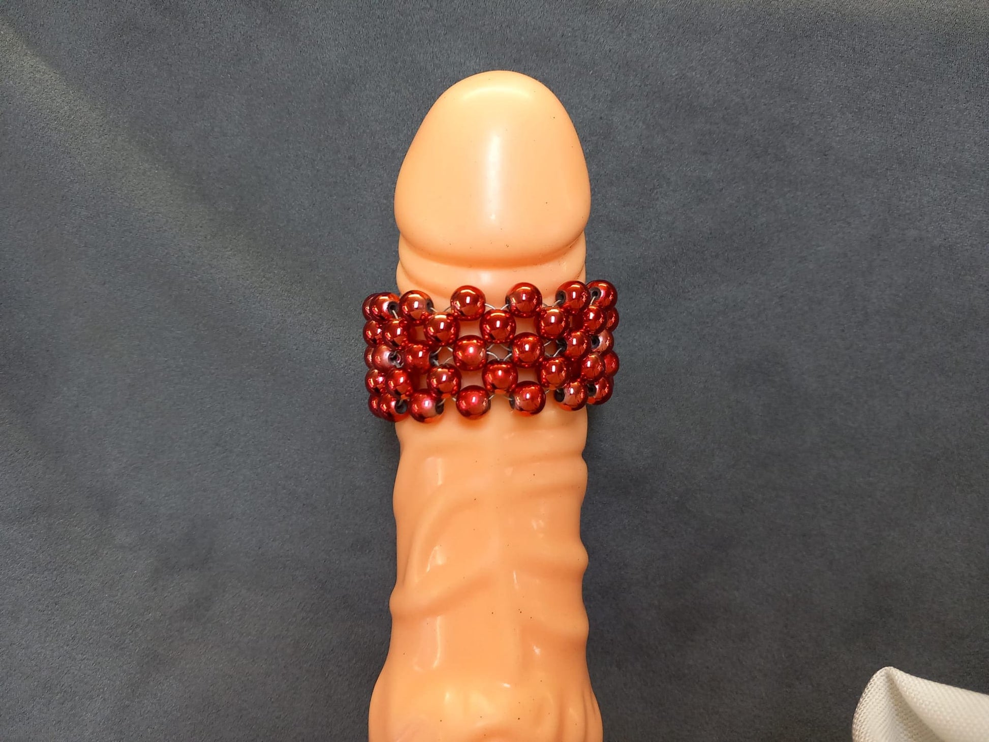 Penisring Masturbator 75 rotierende Blut rot Hämatit - Perlen auf Chirurgenstahl Innen - Umfang ca 11,6cm - SEXSENSE